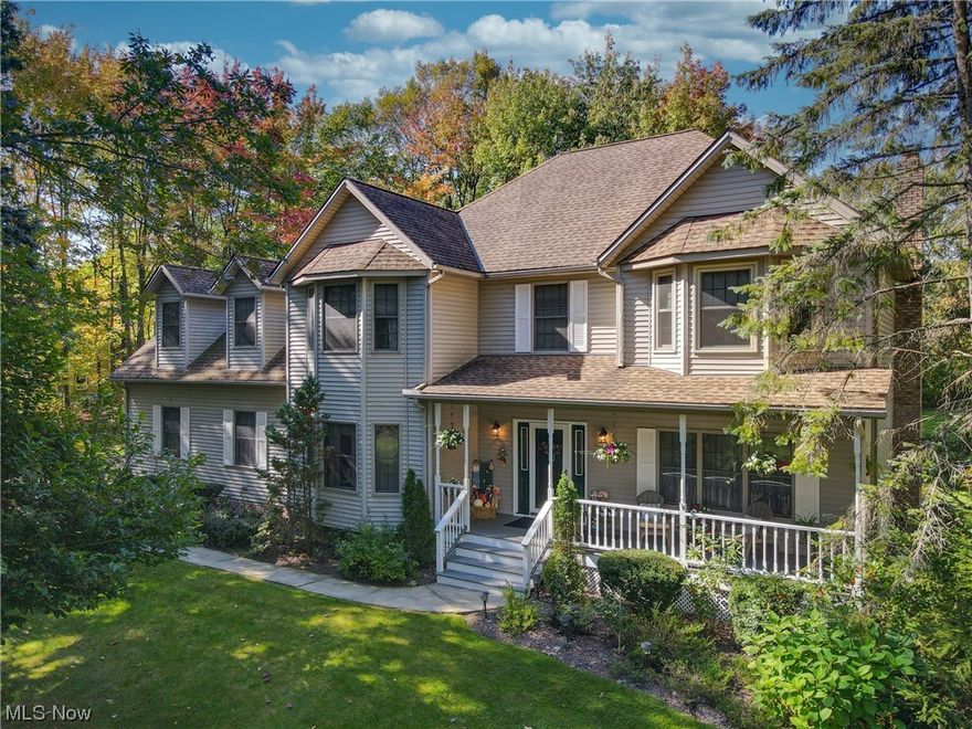 Wonderful  well maintained Front Porch Colonial!!  Walk into a large entry that leads to a formal living and dining room.  This five bedroom home features a large second floor master suite with an additional large 5th bedroom on the second floor that is being used as a family room!! A chefs eat in kitchen with island and tons of cabinets offers a huge eat in dining area with sliding doors open to  deck, perfect for entertaining .  The rear foyer features a second staircase leading upstairs , mudroom area and laundry.  An open family room with fireplace. A finished lower level offers a family room and bonus entertaining area. An additional staircase to the Lowe level from the 3 car garage.  A large deck overlooks an amazing private  3 acre lot at the end of the cul-de-sac.  A/C and Furnace are under 2 years old.  Hot Water tank is 1 year old.  Roof is newer.  Impeccably maintained throughout!!