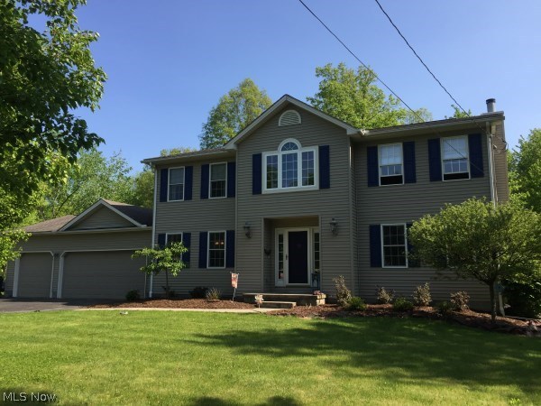 Prime suburban living! Exceptional 4 bedroom, 2.5 bath home on 1.13 acres with scenic wooded view - yet convenient to everything. Two-story open foyer/staircase, crown moldings, formal living & dining rooms, oak kitchen w/dining space + island w/breakfast bar. Spacious family room w/fireplace, full basement w/huge rec room, plenty of storage & private home office. Attached 3 car garage. For summer entertaining - super size deck + 24' round above-ground pool. Overlooking wooded area.