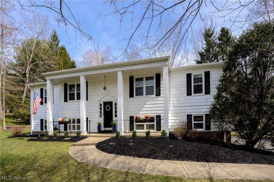 Set on a breathtaking 3.88-acre wooded lot in Russell Township, this stunning Novelty home showcases the perfect blend of modern rustic design and serene natural beauty—just 5 minutes from the heart of Chagrin Falls. Surrounded by mature trees and open green space, the property offers a private, picturesque setting while still being close to boutique shops, dining, and the village’s iconic waterfalls.

Inside, the thoughtfully designed floor plan features rich wood floors, beam accents, and a striking two-sided fireplace that anchors the open living space. The chef-inspired white kitchen is both elegant and functional, complete with leathered stone countertops, a large island with cooktop and seating, and an expanded dining area with custom cabinetry and a spacious serving station. A light-filled primary suite with a spa-like bath provides a relaxing retreat, while the main level also includes an additional bedroom and full bath. The finished lower level adds even more flexibility with a second family room, two additional bedrooms, a newly built full bath, laundry, and access to the attached 2+ car garage.

Located in the highly rated West Geauga Local School District—serving Chesterland, Russell, and Novelty and consistently ranked among the best in the state for academic achievement. Enjoy nature at your doorstep with close proximity to Russell Uplands Preserve and The West Woods, offering hiking, fishing, and endless opportunities to explore the scenic Chagrin Valley. Please contact us for the full list of improvements.