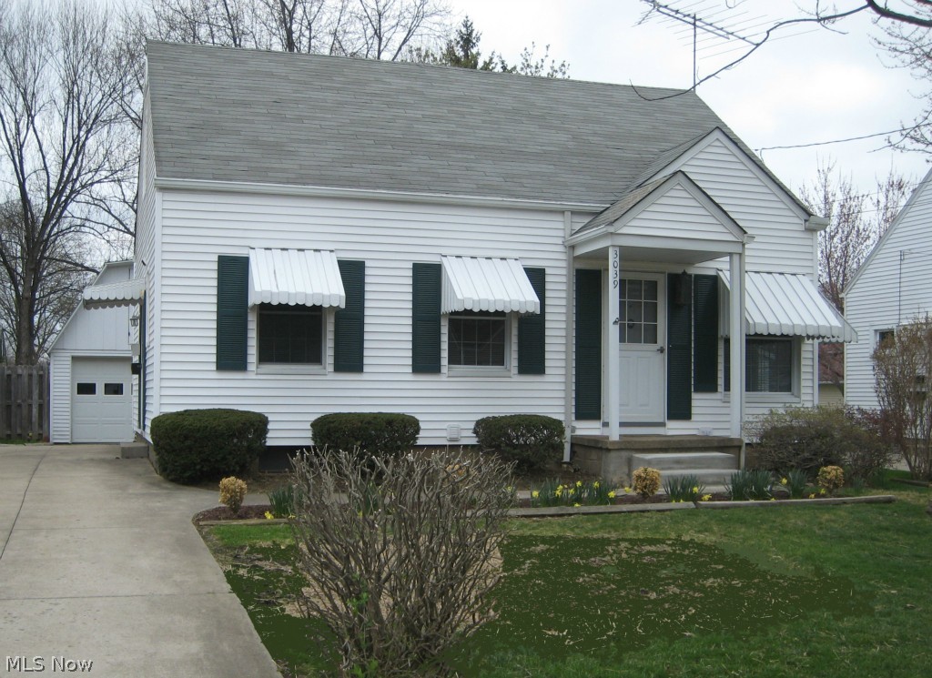 Vinyl sided Cape conveniently located in Cuyahoga Falls near everything. Lions Park is right up the street! Recently updated with new paint throughout and brand new carpet and kitchen floor. New furnace. Beautiful hardwood floors in the bedrooms. Spacious 2nd floor bedroom with attached half bathroom and build-ins and ample storage. Two story garage provides extra storage with pull down steps. Screened porch connected to garage. Unusually deep back yard. Includes home warranty.