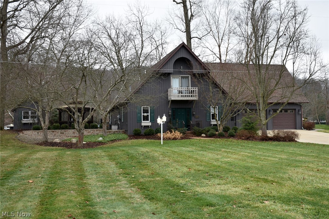 Charming 3 bedroom 2 bath riverfront home on a .64 acre level lot with attached spacious 28x28 2+ car garage. Beautiful landscaped lot with paver patio, wooden gazebo, and storage shed. The 2,220 square foot home has a private living room, great room with open floor concept to kitchen and dining. The spacious all glassed in sun room overlooks the Muskingum River and stone riverbank. The oak fully applianced kitchen has Corian counters and island. Home is in excellent move-in condition.