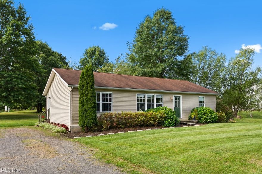 Look no further! Washington township, Marlington schools! One-owner home, custom-built beauty! 3 bedrooms/split bedrooms,3 full baths, first-floor laundry. Large rooms, loads of cupboards, and closets. Rec room, 2 bedrooms, and full bath in lower level with large pellet stove. All kitchen appliances are to stay. 5 acres of gorgeous park-like land, flowers blooming everywhere, greenhouse, large 4-6 car garage, barn, deck plus much more. Beautiful property, don't pass it by! Call for a private showing or details.