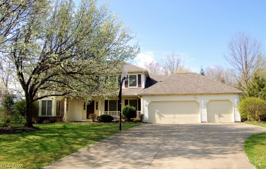 Pretty transitional style with a 3 car garage situated on the cul de sac with a treed backyard and large deck with an awning. The two story foyer opens to the office/library and formal living room and dining room. There is great cabinet space in the kitchen with granite counter tops, a center island, appliances, an eating area with sliding doors to the deck and a first floor laundry. Open from the kitchen is the awesome 22’x21’ family room with a volume ceiling and a fireplace – perfect for entertaining. All bedrooms are on the second floor with the master suite featuring a walk in closet and bath with double sinks, shower and whirlpool tub. The other bedrooms and full bath are generously sized. Plenty of room to play and entertain in the finished lower level recreation room with a full bath and wet bar area. Roof 2015, furnace 2008, air conditioner 2009, water heater 2013.