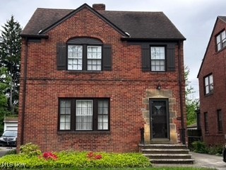 Brick colonial-style home with a 3-car garage plus work space. Room for vehicles, hobbies, and storage. This home has a formal living room with fireplace, a spacious dining room with an arched entry and access to the enclosed back porch. Hardwood floors in living room, dining room and upstairs bedrooms. Kitchen has adjacent breakfast room. On second floor are three bedrooms and full bath with both tub and shower, plus a finished 3rd floor room to be used as a bedroom, private office or game room. Recreation room in basement has a fireplace and newer LVT flooring. Central air conditioning. Laundry area includes washer and dryer. Photo-sensor smoke detectors and CO detectors throughout. Fenced backyard and a concrete patio behind the garage can accommodate table and chairs for a private get-together. POS-compliant. An ideal location with quick access to shopping, the Cleveland Clinic, University Hospital, CWRU, and downtown Cleveland.