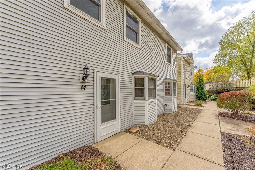 What an amazing opportunity to own a 2 bedroom condo on the outskirts of Mantua! This well-kept unit boasts comfort and charm throughout.  Gorgeous entry into large foyer with wood floors.  Living room with fireplace greets guests, with 1/2 bath and laundry off main hallway.  Formal dining room and large oversized kitchen complete first floor.  Kitchen has plenty of cabinet space and countertops, with eat in bar area.  Additional living room off kitchen and formal dining room is perfect for family gatherings and holidays.  Head upstairs for 2 large bedrooms, including master bedroom with its own fireplace - perfect for those cold winter nights.  This is one of the largest units, private parking and very close to downtown Mantua.  Schedule your showing today before this one is SOLD.