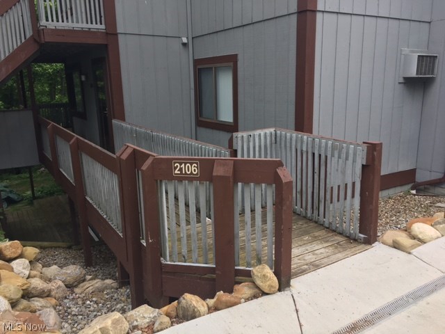 Welcome to 2106 Pinebrook Trail. Move into this cozy condo with Living Room with woodburning fireplace or step onto the deck to enjoy the scenic wooded view. Very affordable living with gas and heat and heating of water paid by association(no gas billing). There is an association maintained inground pool to enjoy. Close to shopping, restaurants & entertainment.