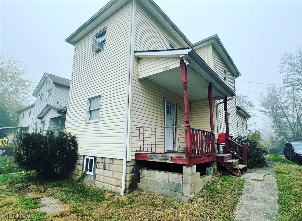 Don't miss this opportunity! Spacious 2-bedroom 1 bath with a large 1 car detached garage. This home comes with 2 additional, wooded parcels across alley.