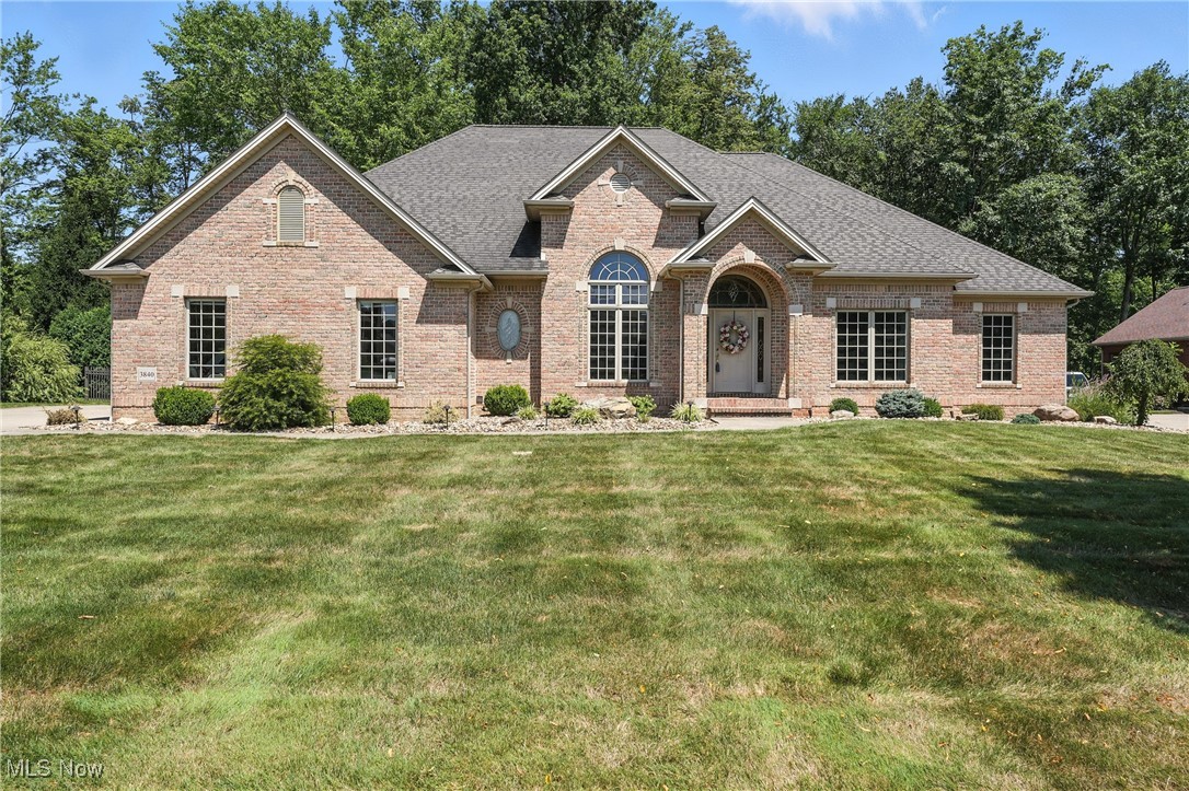 Canfield's Villa Rosa Community! Brick front ranch plan with private wooded backyard. Grand entry foyer, French doors to den, designer kitchen with granite open to great room with fireplace and full window wall. Dinette with French doors to patio. Master bedroom suite with deluxe master bath. Two additional bedroom with shared bath. Brand new 1800 sq/ft finished lower level with bar, entertainment center and steam bath. Elevated ceiling heights with large windows give this open floor plan an abundance of natural light!