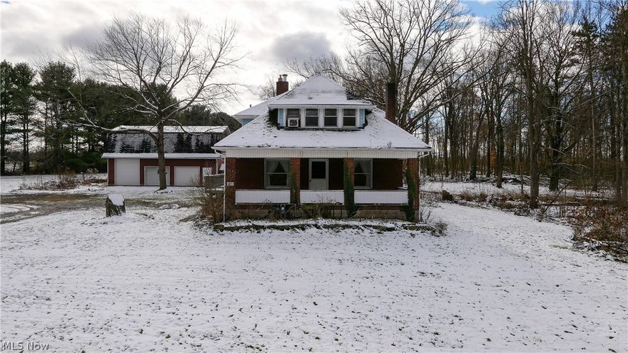 This beautiful farmhouse on 4.7 acres is ready for new owners. Featuring a first floor master suite, large living room with fireplace, country kitchen and den, the home is full of charm. Upstairs, there are three more bedrooms and a bathroom. Remodel has been started upstairs, but needs to be finished. Bring your ideas to make this space perfect for your taste. Huge 3 car garage, with one oversized door and full second story give plenty of room for tinkering on cars or that workshop you’ve always dreamed of. The back patio has a brick oven and bar for your entertaining needs. Schedule a showing now before it’s gone! Seller to escrow for any required septic repair/upgrade.