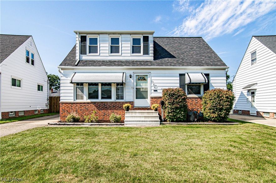 Come and tour this charming bungalow featuring many new updates in the past few years including a newer roof, electrical panel, front picture window, steps and a brand-new A/C. 2 bedrooms on the main floor boast hardwood flooring and ceiling fans. Bright and sunny eat in kitchen and all the appliances stay. The second floor has a huge dormer with many built-in cabinets, several closets, and a storage area with plenty of room for your bedroom and a sitting area. Finished basement with a bar, wet sink, and glass block windows. Great place to entertain your family or friends. Full bath in lower level too! Newer 2.5 car garage and has additional shed behind it for even more storage. The basement has been waterproofed by the prior owner. Close to shopping, dining, and the local schools. Just move in and unpack!