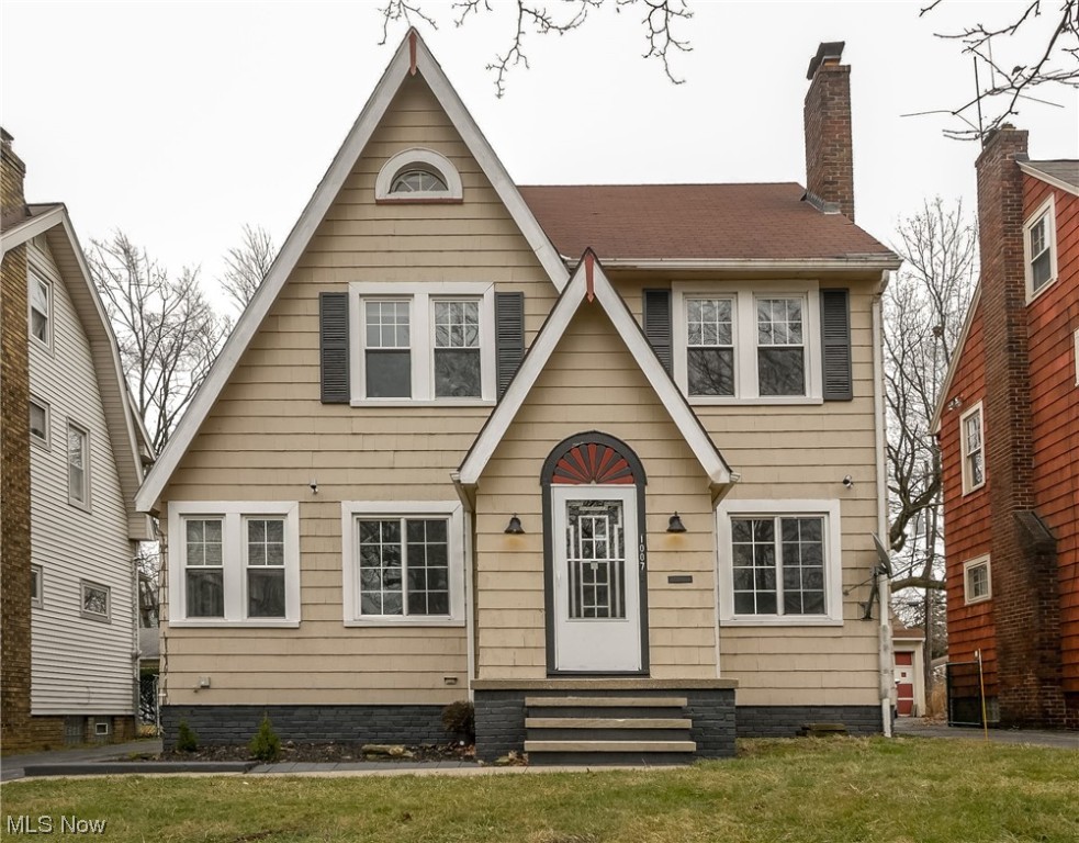 A fabulous recently renovated XL Colonial on a quiet street in Cleveland Heights, which will be violation free at transfer. House features 3 finished floors with a total of 4+ bedrooms and 1.5 baths. The first floor offers a large living room with a unique art deco fireplace. The space then opens to a substantial dining room, a sun room, a generous size kitchen with an eating area and the half bathroom. The second floor showcases 3 bedrooms, a gorgeous bathroom, and an enclosed porch. The finished 3rd floor resembles a suite and comprises of 1 + bedrooms. 1 bedroom and an extra room. The home exterior and the 2 car garage have recently been freshly painted and added a significant upgrade to its appeal.