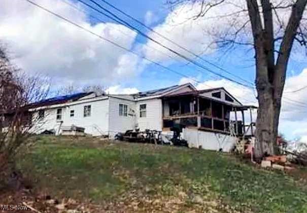 Opportunity awaits at 73 Comer St in Parkersburg! This 2-bedroom, 2-bath home offers approximately 1,100 sq ft of living space and sits on a 0.18-acre lot. In need of restoration, this property presents the perfect chance for investors or handy buyers to bring new life to a solid structure in a convenient location. With some vision and effort, this could be transformed into a charming residence or rental. Don’t miss out on the potential this property holds!