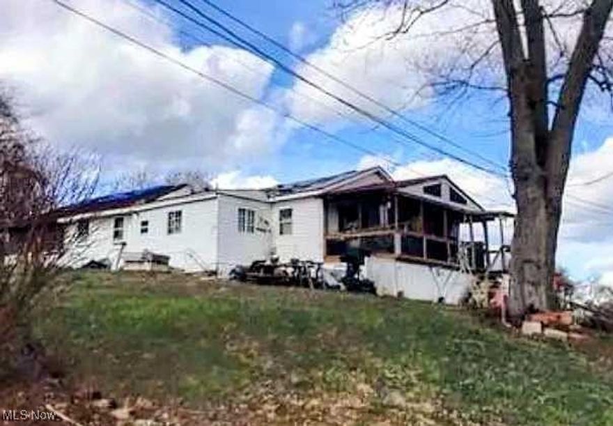 Opportunity awaits at 73 Comer St in Parkersburg! This 2-bedroom, 2-bath home offers approximately 1,100 sq ft of living space and sits on a 0.18-acre lot. In need of restoration, this property presents the perfect chance for investors or handy buyers to bring new life to a solid structure in a convenient location. With some vision and effort, this could be transformed into a charming residence or rental. Don’t miss out on the potential this property holds!