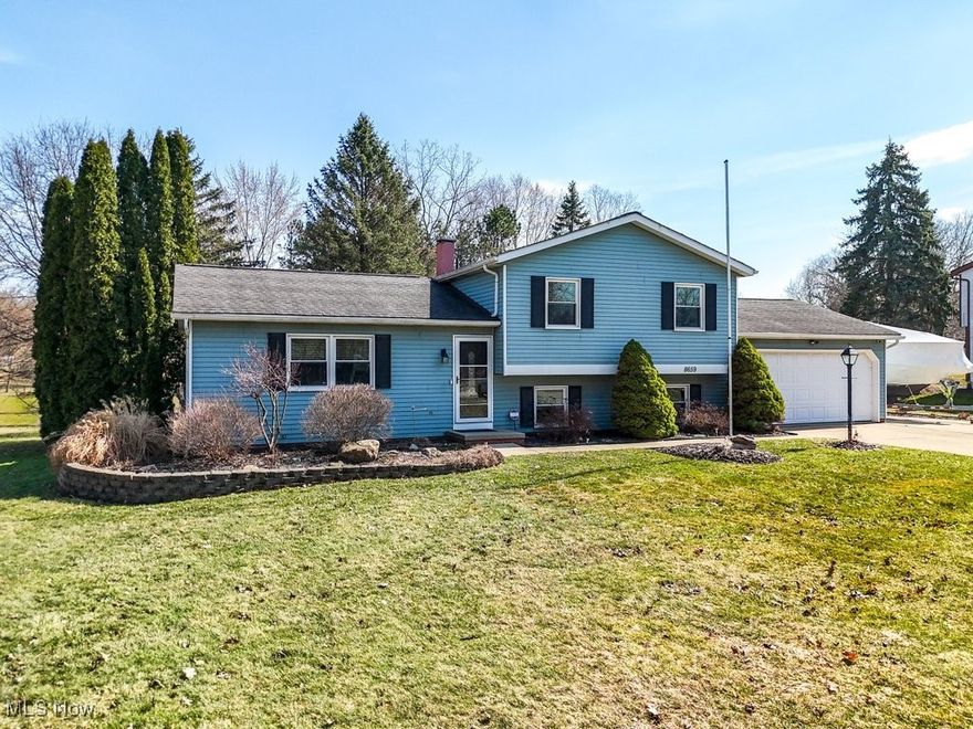 Welcome to your happy place!  Start the next chapter of your story in this 3 bedroom, 2 bath, move right-in split level on a 1/2 acre in Macedonia. Unpack and plan your housewarming and first BBQ for 2025. This home has been totally remodeled from the bottom to the top, and now has an open concept kitchen, dining room and living room. The kitchen has stricking quartz countertops, tile backsplash and stainless steel full appliance package, including the washer and dryer.  The dining area has a slider door for easy access to the deck and very spacious backyard.  Newer features include remodeled bathrooms, new vinyl windows, HVAC, water softener and water heater.  Outside features include landscaping(retaining walls), a driveway addition, decks/shed, garage(220v/30a) and so much more. The City of Macedonia has one of the largest City-owned park systems in Ohio at over 325 acres, and the Macedonia Family Rec and Fitness Center with an indoor pool. Plenty of restaurants, shopping, theater, bowling and the Cuyahoga Valley National Park for hiking and breathtaking views of Mother Nature. Everyone has a story, begin yours here~