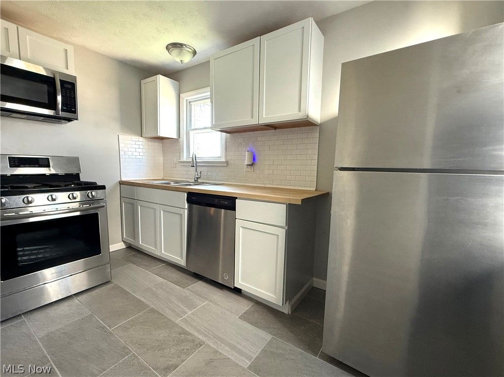 Photo of 4606 Lincoln Avenue, Parma, OH 44134 (MLS # 5203056)