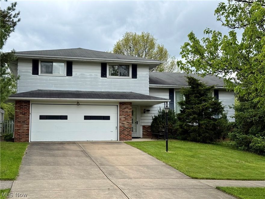 Pristine 4 level split located in the desirable Gettysburg Estates awaits !   This meticulously maintained home will give you the feel of stepping back in time.  The spacious living room with gleaming hardwood floors is graciously filled with natural light from the large picture window and conveniently open to formal dining area and kitchen, making it perfect for large gatherings.  Lower level offers 1/2 bath and an expansive family room area with sliders leading to the patio in the fenced yard.  Upper level boasts 4 generously sized bedrooms with hardwood floors and ample sized closets along with overhead lighting and a pristine full bath.  Attic access in hallway and second bedroom closet.  Basement holds the workshop, utility & laundry area in addition to another storage room and shower..  2 car attached garage. Conveniently located to public transportation, shopping, restaurants, & I-77.   This home has endless possibilities, just bring your creative talents to life to make it home.