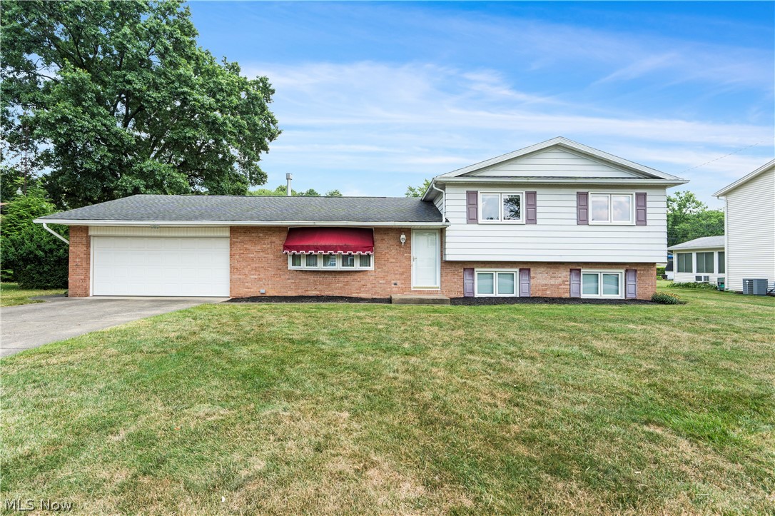 Enjoy this spacious 4 bedroom, 2.5 bathroom split level home located on a wonderful, flat .33 acre lot in a desirable neighborhood in the Plain Local School District. This home has 2,022 sq. ft. of living space and it's as neat, clean and well kept as you will ever see. The main level features a large living room with a bay window, a kitchen with plenty of cabinet and counter top space, tile backsplash and all of the appliances, a formal dining area and a 4 seasons sun room with a sliding glass door leading to a cement patio that's perfect for entertaining family and friends. The lower level features a huge family room with a brick fireplace, a 4th bedroom or home office and an updated 1/2 bathroom. Upstairs has a nice sized owners suite with beautiful hardwood floors and a private updated owners bathroom with a walk in shower, 2 more ample sized bedrooms with hardwood floors and another full bathroom. The basement has the laundry area and offers plenty of room for storage and it has been professionally waterproofed. Other features include a 2 car attached garage with opener, newer vinyl windows throughout, a forced air furnace, A/C, a water softener and more. This wonderful home is in immaculate condition inside and out and it's tucked away in a great neighborhood with sidewalks, it's close to parks and it's only minutes away from Belden Village and all it has to offer.