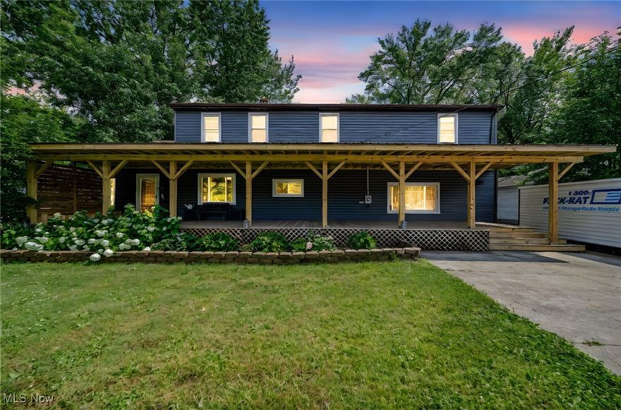 Welcome to your dream home in the highly sought-after Mentor Acres neighborhood! This beautifully updated 5-bedroom, 2.5-bath gem offers the perfect blend of comfort, style, and convenience just minutes from top-rated schools, shopping, dining, and scenic beaches. You're greeted by an expansive 12x60 covered front porch, newly built, and ideal for morning coffee or unwinding at the end of the day. Out back, enjoy a fully fenced yard featuring mature grape vines, a spacious deck and cozy fire pit perfect for relaxing or entertaining . 

Inside, the charm continues with a generously sized living room centered around a wood-burning fireplace and a gorgeous remodeled primary suite, complete with an oversized walk-in closet. Newer modern windows throughout, fill the home with natural light and the newer roof adds extra value and energy efficiency. 

For added peace of mind, the seller is including an America's Preferred Home Warranty so you can move in with confidence. This home truly has it all - space, style, and a prime location. Don't miss the chance to make it yours!