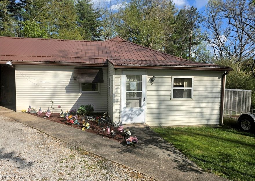 Tucked away in a quiet, secluded area of Coshocton, this charming 2-bedroom, 1-bath ranch sits on just over an acre of peaceful land and offers a blend of comfort, updates, and practical outdoor features. The home includes a metal roof, a new well installed in 2022, a new gutter-guard system added in 2025, new windows in 2024, and an updated electric panel completed in 2025, along with a convenient generator hookup for peace of mind. A former third bedroom has been thoughtfully converted into a spacious laundry room. Outside, you’ll find a storage shed plus a custom-built outdoor man cave/tool shed—perfect for hobbies, projects, or relaxing. With its private setting and valuable improvements, this property offers a great opportunity for anyone seeking space, tranquility, and move-in-ready updates.