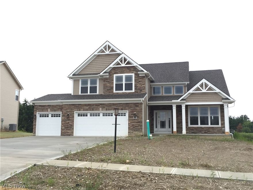 2,966 4 Bedroom 3.5 Bath w/ Finished Basement.  Kitchen includes Hardwood Floors, Granite Countertosp, Tile Backsplash, Satin Nickel Hardware, Maple Cabinetry.  999 sq ft of finished basement.