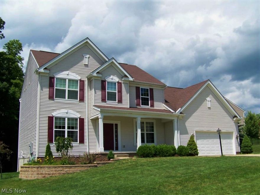 Fabulous 5 BD/4 BA custom colonial located on cul-de-sac street in Ridgewood Falls. Large scenic yard backing to wooded green space, inviting front porch. An open foyer welcomes you, flanked by the formal dining room and first floor office with French doors. Great Room is accented with a gas log fireplace and opens to the spacious fully applianced kitchen w/breakfast bar island and bright, sunny morning room. You'll appreciate a flexible first floor bedroom and full bath plus large 1st floor Laundry. Second floor offers the vaulted and extra large Owner's Suite complete w/glamour bath - jetted tub, dual sinks separate shower, walk-in closet, plus 3 more nice size bedrooms. Enjoy extra living space with a finished basement complete with a second kitchen, recreation room w/fireplace, another full bath, plus lots of storage and a separate entrance. Has been used very comfortably as a private in-law suite, or what a great "man cave." Additional amenities of this unique home include a large