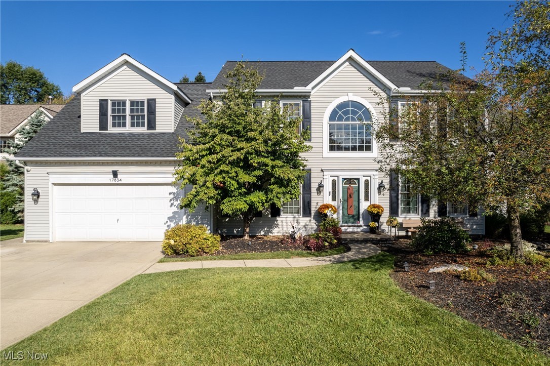 Welcome to this exquisite 4-bedroom colonial in the highly sought-after Waterford Crossing community of Strongsville, where timeless design meets modern luxury. The grand foyer opens to a bright and airy living room and a warm inviting family room, highlighted by a classic brick gas fireplace that creates the perfect gathering space. The chef’s kitchen has been completely reimagined with upgraded vinyl flooring, a custom tile backsplash, contemporary lighting, refreshed cabinetry, and premium stainless steel built-in appliances. An elegant dining room with new flooring offers the ideal setting for formal meals, while a versatile office or playroom with gleaming hardwood floors adapts beautifully to your needs. A thoughtfully placed laundry/mudroom connects to the attached 2-car garage, and a stylish half bath completes the main level. On the upper level, the dramatic catwalk design enhances the open flow leading to an extraordinary primary suite. This private retreat features a spacious sitting room or office nook, dual walk-in closets, and a spa-inspired bath with a walk-in shower, soaking garden tub, upgraded counters and cabinetry, designer lighting, and refined ceramic tile. 3 additional bedrooms with double closets share a sophisticated full bath with dual sinks and modern finishes. The finished lower level offers a world of possibilities with abundant living and entertaining space, including a recreation room with space for a pool table, a fitness or flex area, generous storage, and a second kitchen equipped with granite countertops, upgraded tile flooring, sink, and refrigerator. Outdoors, the backyard has been designed for both relaxation and entertaining, showcasing a spacious concrete patio, hot tub, built-in fire pit, and a beautiful gazebo with TV—an outdoor retreat to enjoy in every season. This residence is a true masterpiece, offering elegance, comfort, and functionality. Schedule your private tour today.