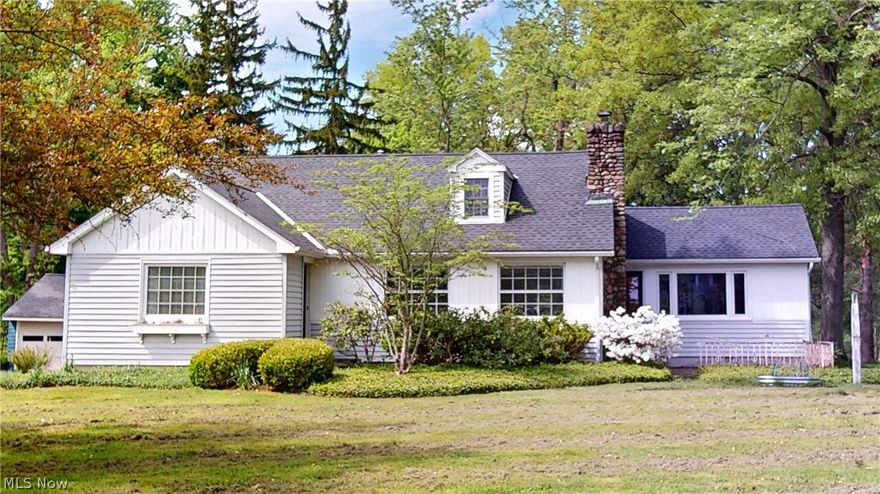 Welcome to this totally remodeled and updated 3 bedroom, 2 bath home located in the beautiful Paw Paw Lake community. All updated painting., lighting. flooring, kitchen and baths.  Large living room featuring lake view,  wood burning fireplace and wood accent wall. Arched entryways leading into the open dining room with built in cabinets and french doors that lead to the newly painted office/library with lots of built in cabinetry and shelving and beautiful woodwork and it's own entrance leading to the courtyard. From the office/library you can head to the large sunroom with plenty of windows and a door leading to the yard. Tons of cabinetry and counter space in the newly remodeled kitchen. First floor Master with a possibility of making a Master Suite. Two closets and wood floors. 
2nd Floor is a very large third bedroom or Bonus room, full updated bath and walk-in storage rooms. Cubbies & built-ns all add to the charm & character of this incredible lake community home. Larger driveway pad for parking and turning around. Large THREE car garage with an attached work shop. Do not miss this opportunity to own a charming home in a desirable location! Enjoy all that Paw Paw Lake has to offer: a private, swimmable lake, boating, hiking trails, picnic pavilion, and fun neighborly gatherings all year.  Easy access to shopping and dining in downtown Chagrin Falls. Geauga County Taxes, Chagrin Falls Schools.