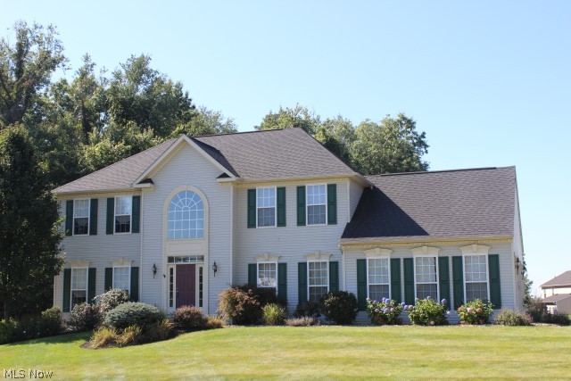 Lovely 4 bedroom, 2.5 bath colonial built 2007 with 2646SF, 3 car side load garage on .59 acre lot in Kings Ridge* Start with the 2 story entry with huge Palladium window & wood floor* French doors to study off of foyer* Formal dining room with wood floor* Great room with stone gas log fireplace & window wall (floor to ceiling windows)* Spacious kitchen with island, breakfast bar, pantry, roll out shelves, ceramic back splash & stainless appliances (gas burner top, double built in ovens, refrig & microwave)* Sunroom with window wall & atrium door to deck* 1st floor laundry with utility tub & 1/2 bath complete the 1st floor* 2nd floor with master with fan, walkin closet & master bath plus 3 additional bedrooms, guest bath & loft* 12 course unfinished basement, insulated poured walls & plumbed for bar & bath* 6 panel Masonite doors, security system, sprinklers, & invisible fence* Beautifully landscaped .59 acre corner lot with deck, stamped patio, fire pit & pergola* Home warranty provid