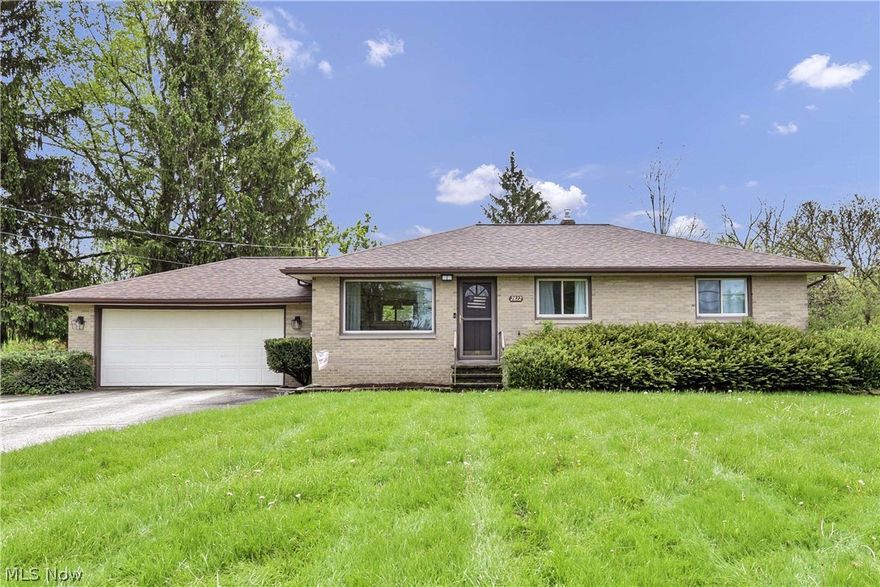 Welcome home to this charming all-brick ranch in Brunswick, offering the ease of one-floor living on an expansive nearly ¾-acre lot! This well-maintained home features 3 comfortable bedrooms and 2 full bathrooms, with a functional layout ideal for everyday living. Step inside to find a spacious living area filled with natural light, flowing into a practical kitchen with ample cabinet space and a cozy dining area. The main floor includes three nicely sized bedrooms and a full bath. The partially finished basement expands your living space and includes a second full bathroom, perfect for a recreation room, home office, or additional entertaining area. Windows were replaced in 2009 with the roof, gutter guards, and electric garage door opener all new in 2021.  Interior updates include quartz countertops in the kitchen and main floor bath, new light fixtures throughout, and refinshed hardwood floors. Outside, the large yard provides endless possibilities including a large shed for extra storage. Ideal for entertaining, gardening, or simply enjoying the extra space and privacy. The all-brick exterior adds timeless curb appeal and low-maintenance durability. Conveniently located near shopping, dining, schools, and major highways, this property combines peaceful suburban living with everyday convenience. A great opportunity to make this beautiful ranch your own!