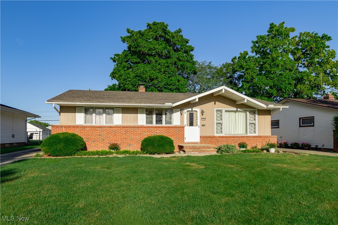 Discover the charm of single-level living in this inviting Mayfield Heights ranch. With 3 bedrooms, 1 full bath, and 2 half baths, this home blends comfort and convenience. Original hardwood floors run throughout most of the home, while the vaulted ceiling and oversized picture window in the living room create a bright, airy feel. The dining room connects seamlessly to the living room, making it an ideal space for gatherings and everyday meals. Enjoy morning coffee or evening relaxation in the sunroom overlooking the backyard, or spread out in the full, partially finished basement—perfect for hobbies, entertaining, or extra living space. A detached 2-car garage adds practicality, and with a little cosmetic updating this home will bring you years of comfortable living. Located in the desirable Mayfield School District and just minutes from shopping, restaurants, and I-271, this home combines a great layout with an unbeatable location.