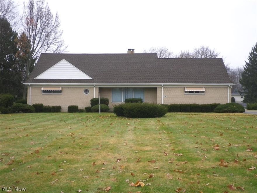 A rare opportunity at 39 W. Caston in New Franklin with 111' of canal frontage in Portage Lakes. Custom built brick ranch offering 2 bedrooms and 1 bathroom, but the attic was always intended to be finished to convert this ranch into a cape.  Planned staircase to second floor in the foyer, could add an additional bathroom, and 2 more bedrooms, upstairs.  Hardwood floors under carpets, except in the sun room. Updated electric panel, newer furnace and central air, roof 10 years old. Property being sold "as is", seller will not do any repairs.