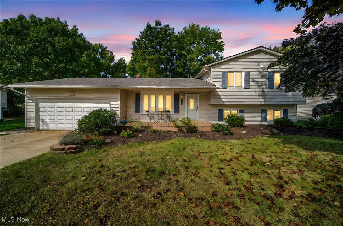 This large 4 level Split offers a lot of options, with the additional basement level. The beautiful hard wood floors, and solid hardwood cabinets, interior doors and trim are just some of the quality updates throughout. The first level opens to an open foyer, Living room and Dining room. The updated kitchen offers solid maple cabinets Corian counter tops, all appliances, eat in area. Off the kitchen is a huge Pantry, entrance way to the attached two car Garage, and the oversize freshly stained deck. The Second level offers 3 good size bedrooms with ample closet space, and full updated bath with a private door to Primary bedroom. The lower level offers large family room with new carpet, a cozy wood burning fireplace, and full bath. The basement level has an office or a 4th bedroom perfect for a teen /in law. Motivated sellers all appliances stay, Lifetime limited transferable warranty on the water proofing, newer 2022 furnace, AC, and hot water tank. Duct worked cleaned and sanitized 7/31/25. Lot of home for the value. Great area Mentor Schools.