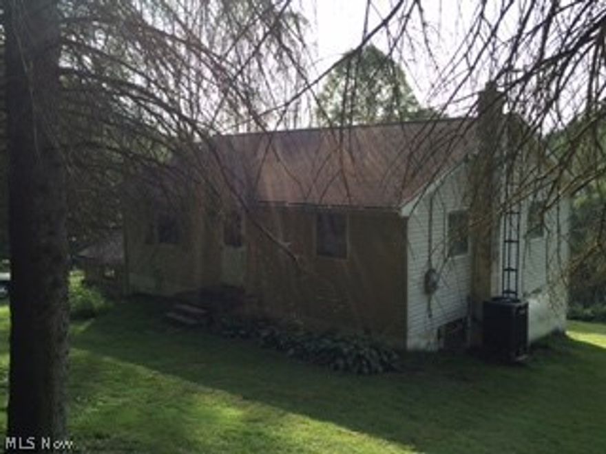 2 Bedroom possible 3rd in Lower level. 2 Bathrooms. 2 Car Garage. Ranch home on 1 Acre.