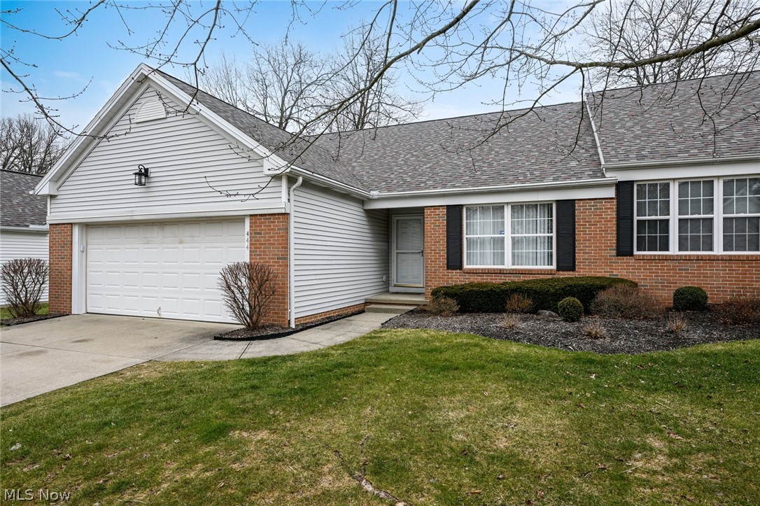 Lovely one-floor living in a well-manicured, low-maintenance community! This sunny two-bedroom home is an end-unit and has just been freshly painted throughout. The main floor has everything you need including two full bathrooms, a full laundry, a huge living area with vaulted ceilings and a cozy sun room. Off of the sun room is a cement patio to enjoy this summer. Worried that one floor wont be enough for you? There is a full, partially finished basement with a mini-kitchen, a third full bathroom, a workshop (workbench included) and walls of storage shelves! Homes don't become available often here so call your favorite Realtor for a showing today!