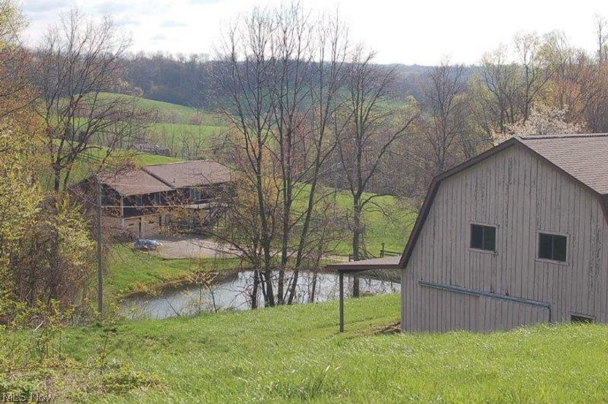 Let this one wet your appetite a bit. A secluded .4 mile lane down to the property opening up into almost 15 acres of which is mostly wooded. The raised ranch home was built in 1982 and features a large walk out deck overlooking the ½ acre pond filtering down into a winding stream through the woods. The home features 1,924 sq. ft. electric heat with natural gas available. Bank barn features a lean to, poured concrete walls and is in good shape. The hot commodity in real estate appears to be seclusion, woods and water and this offering has it all.