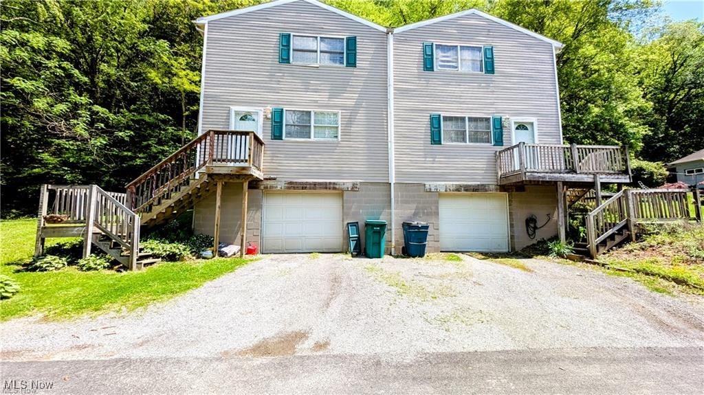 This property offers multiple ways to purchase. In this listing the buyer is buying only unit 37 Alaska or 1/2 of the entire duplex. This offers a more affordable housing option for buyers who want modern two bedroom housing and do not wish to own both sides of the entire duplex. This spacious home offers a large kitchen with dining area, living room bath and two bedrooms. The master bedroom is big enough for king sized furniture and has three closets. The second bedroom could easily hold a double bed and furniture. Enjoy in house laundry in the basement as well as your own garage space with inside access. This unit offers a small portion of the land - only what is directly behind the unit or to the right of the duplex which is perfect for the buyer who does not want to spend much time on lawn care. Enjoy your private back deck and landscape to your own tastes. Don't waste money on rent, buy this home instead.