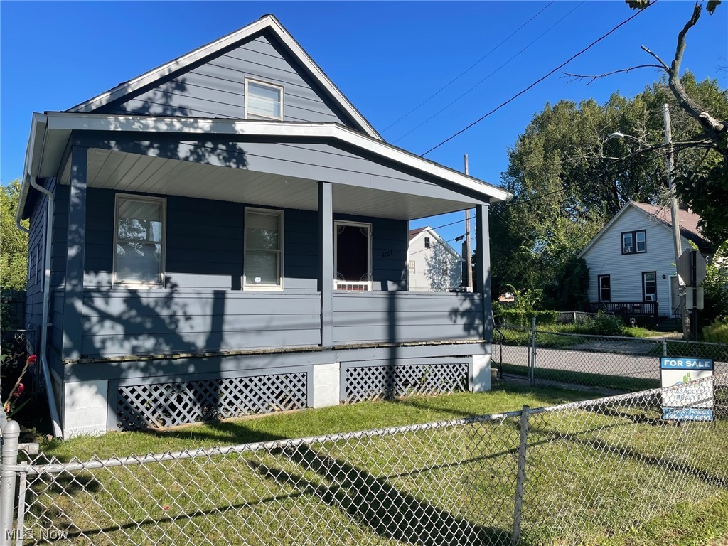 This home is agent-owned and being sold As-Is. A wonderful starter home, downsize opportunity, or an excellent addition to your rental portfolio. Many updates include a new forced-air furnace, kitchen faucet, countertops, stove top vent fan, new laminate flooring in kitchen and bath, new tub, shower surround, bath sink, vanity, medicine cabinet, bath and kitchen lighting. Fresh paint in the downstairs bedroom, living room, kitchen, and bath. The two upstairs bedrooms and living room include window AC units! The exterior of the home has also been painted. The home has Tilt-in replacement windows. Laundry hook-ups are available in the basement. New roof and gutters installed within the last ten years.