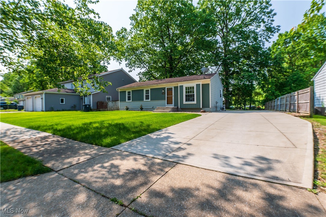 Welcome to 1436 Gurley Ave. This well-kept 3-bedroom, 2-bathroom ranch-style home offers comfortable living with extra space to spread out and enjoy. With 960 square feet on the main level and a fully finished basement, there’s a lot more here than meets the eye.
The main level features a practical layout with a comfortable living room and an eat-in kitchen that has plenty of cabinet and counter space. All three bedrooms are located on the main floor, along with a full bathroom that's easy to access from every room.
Downstairs, the finished basement gives you a great second living area or entertaining space. It includes built-in shelves along the walls, a wet bar that’s perfect for hosting friends or relaxing at home, and a second full bathroom with a large jacuzzi tub. It’s a great spot to unwind after a long day.
The backyard is private and peaceful, with beautiful mature trees that provide shade and a calm atmosphere. There's also a brand-new shed for extra storage and a concrete patio where you can set up a grill or outdoor seating area. Whether you enjoy working outside or just relaxing in the shade, this backyard has what you need.
Located close to tons of shopping and dining options, this home puts you just minutes away from everything you need. Whether you’re looking for your first home, downsizing, or just want a move-in ready house with great extras, this one is worth checking out.