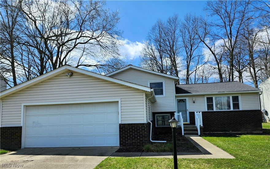 Looking for a solid home, on a quiet cul-de-sac street, in a wonderful Brunswick Hills neighborhood, with a wooded lot, basement & an attached oversized garage? Then you shouldn't miss seeing this quad-split level home!  As you enter the front door, you'll immediately notice the gorgeous wood floors throughout the main floor.  Lots of natural light brightens up the Living room with is open to the Dining room with a great view of the wooded backyard with a deck & shed.  The kitchen has a double sink, garbage disposal, plenty of cabinets, pantry, refrigerator, range, dishwasher and microwave.   The upstairs has 3 carpeted bedrooms and a full bath. The lower level is just a few steps away with a spacious Family room & a wood burning fireplace.  The Laundry room is also on this level with Washer, Dryer, Wash tub, plenty of work or hobby space with a view of the backyard.  There is also a Waterproofed Basement, transferable and guaranteed for life, that renews yearly for only $40/yr.  Other updates include A/C & Micro-ban Air cleaner (2021), Rheem Gas Furnace (2017), April Air (2014), and Roof (2013).  Another benefit is that there are no RITA taxes in Brunswick Hills Twp!  Convenient location close to Shopping, Dining, Parks, Recreation & Medical Facilities! Call to schedule your personal tour! Don't delay, make your next move! Ohio State Waterproofing Inspection report 4-9-2024 is a supplement attached.