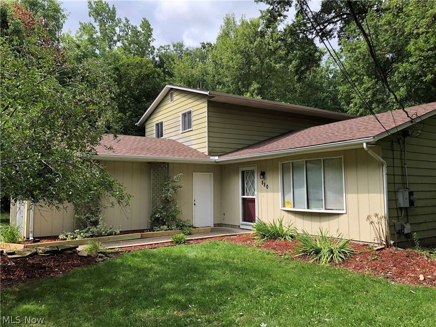 This spacious bi-level sits on the final lot of a dead-end street, adjacent to Lorain County Metro Parks property. The
home features a cozy wood-burning stove set in a brick place, an arching stairway, two living areas, a large laundry
room, and a flowing layout. In addition to the serene, wooded setting, the yard contains apple, cherry, peach, and
chestnut trees. New roof, gutters, and venting installed in August 2018!! With schools and parks nearby, and just blocks south of Lake Erie, this is an ideal home to raise a family.
