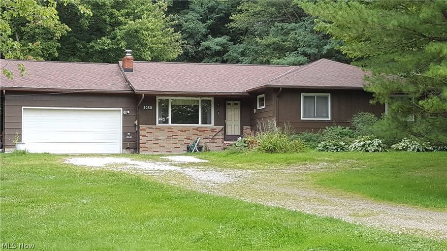 Check out this 3 bedroom 1.5 bath home located in Monroe Township. It is nestled in the front of portion of 5 acres of the acres