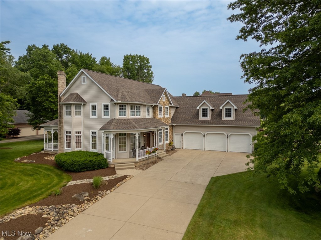 Welcome home to this custom built 5-bedroom, 5-bath 3400SF home in the Brittany Oaks
Subdivision in Howland. This corner cul-de-sac home was designed by the owner for versatility
and functionality. It features a large kitchen designed for multiple chefs to be able to work in
unison. There are two sinks, ovens, cooktops, dishwashers, a beverage fridge and French door
refrigerator. It's open to the informal dining area and the family room that has a gas fireplace
with custom double mantle. There is a large walk-in pantry closet as well. The 1st floor, which
features 10 ft ceilings and crown mouldings, also has two flex rooms designed to be living room,
den, dining room, guest room or offices. There is also a full bath, a homework station, and a
private office that overlooks the back yard. The 1 st floor laundry room with built-in ironing
board is also designed for crafts and additional pantry space including an upright freezer. The
rear of the home features an enclosed 3-season porch with attached gazebo. Upstairs you will
find the 5 bedrooms including a master suite equipped with a two-way fireplace, spa tub,
private shower/toilet room, walk-in closet, and unique built-in jewelry cabinet. The other four
bedrooms share 2 nice sized bathrooms that feature private bath/toilet rooms, with one
bedroom leading to a walk-in attic over the garage that could easily be finished for additional
living space. In the huge, partially finished basement you will find a full bath and plenty of
additional space that has a ton of potential to be finished off to meet your family’s needs. If all
this isn't enough, THE SELLERS HAVE TAKEN CARE OF ALL THE MAJOR UPDATES- NEW ROOF &
GUTTERS, DUAL HVAC SYSTEMS, TANKLESS GAS WATER HEATER, AND EVEN WINDOWS! Homes
such as this don't come along very often so don't miss out on this exceptional opportunity!