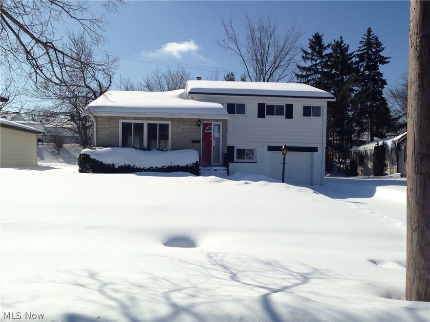 This single family split level style home features six rooms. First floor offers a living room, kitchen with eat in area. Upstairs features the three bedrooms and full bath. Lower level offers a storage area, half bathroom, and access to three seasons room off the back of the house. Basement features more storage and utility area. Property offers a two car attached garage.