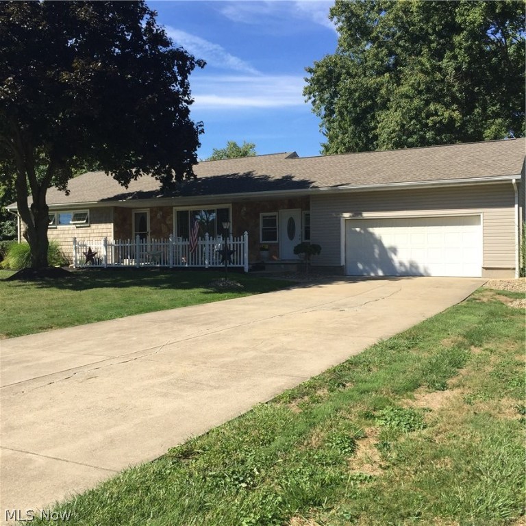 Charming updated ranch in Rootstown with a half acre lot. This home features three bedrooms and two full bathrooms. The living room is open to the eat in kitchen with newer carpet and hardwoods throughout. There are hardwoods under the living room carpet as well. The kitchen has cornia countertops and a new sink as well as new stainless steel appliance that stay with the house. The finished lower level has been updated with recessed lighting providing tons of light. A full bathroom and office complete the lower level. Other updates include new roof, windows, updated electrical panel and front door. Call today to schedule a private showing! (New Aeration system being installed.)