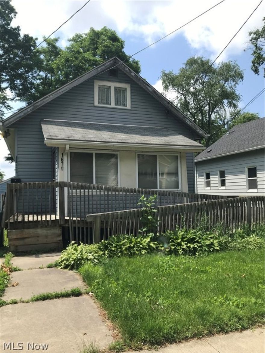 Attention Investors! This is 3 bedroom 1 bath home has so much potential. There are 2 bedrooms on the first level and a large bedroom on the second level. Lots of storage. It has a full basement. 2 car detached garage. This property is sold as is. Cash offers only.