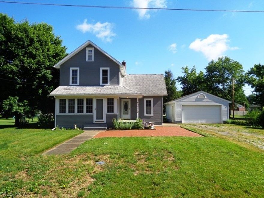 Two Story Home Located In Sandyville Area w/Magnolia Mailing Address. This 1,518 Square Foot Home Features Inviting Front Porch. Large Formal Dining Room Overlooks Updated Applianced Kitchen Includes Custom Cabinets and New Flooring. Living Room w/Hardwood Flooring Opens To Sunroom w/Many Windows. First Floor Master Bedroom w/double Closet Has Private Access To Main Full Updated Bathroom. Second Level Includes Two Large Bedrooms, Walk In Attic w/Plenty Of Storage Space. Full Basement. Detached Two Car Garage. Updates Include: Public Water Connection, 2016 Custom Kitchen Cabinets, Most Flooring, Some Light Fixtures, Some Walls Redone, Insulation, Some New Doors, Electric, House Roof 2000, Vinyl Siding 2015 & Windows. Selling As Is.