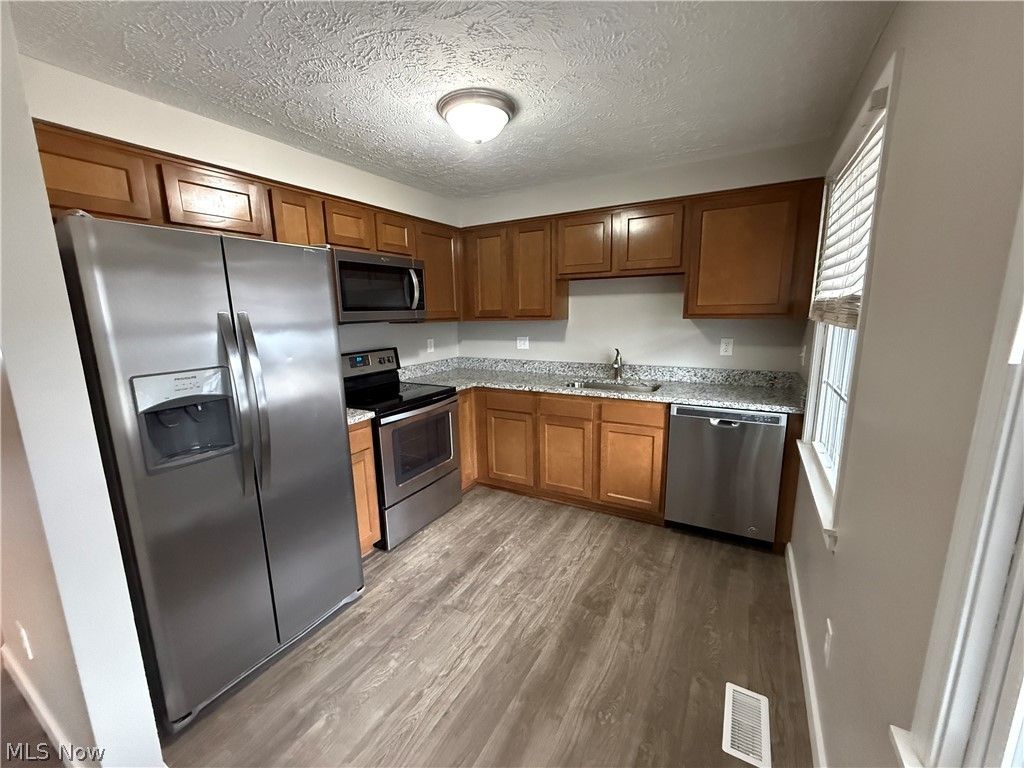 Photo of 7415 N Chestnut Commons Drive, Mentor, OH 44060 (MLS # 5190971)