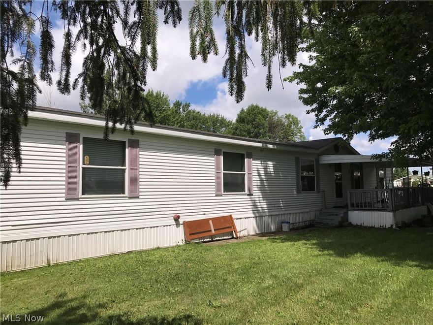 This manufactured home is oh-so-spacious! Conveniently located in West Ridge Green Mobile Home Park, just a short 10-minute ride to the interstate & shopping mall, yet with a rural flavor.  Large rooms in this home allow for oversized furniture. Airy kitchen with island & dishwasher. Two and one-half baths including Master Bath with soaking tub and walk-in shower.  Vaulted ceilings add to the feeling of spaciousness.  18'x9' porch to relax on!  Park has a beautiful built-in pool and playground for your enjoyment. (NOTE: Property tax Homestead Reduction amount has been added back in on this printout to reflect full current tax amount). THIS HOME PRICE IS FIRM AND REFLECTS THAT THE ROOF WILL NEED TO BE REPLACED BY NEW OWNERS. SELLER TO MAKE NO REPAIRS. Buyers must be submit Application for Residency to Park Office and be approved following background check and meeting financial guidelines indicated in park application. $30 non-refundable fee for each adult aged 18 and over who will be re