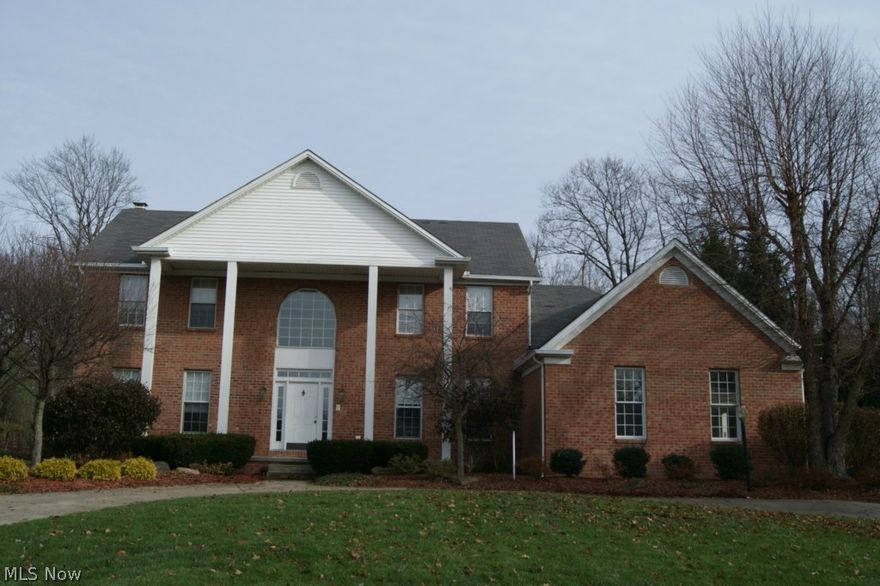 3 car garage with walk down to basement. Newer gas furnace. 12 coarse basement. central vacuum. 9' first floor ceilings. Private wooded lot.