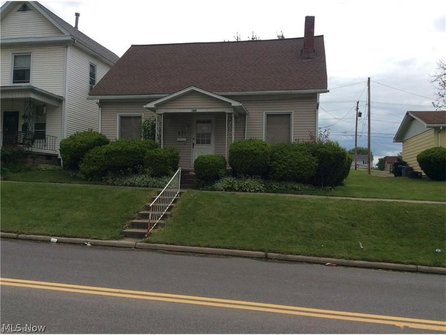 Cute 1 1/2 story home with newer vinyl siding and roof. Spacious living room. There is a bedroom on the first floor and laundry too. Upstairs is a second bedroom with a possible 3rd bedroom option. 24x28 garage. Conveniently located on S 2nd St in Byesville.